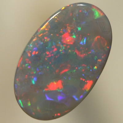 SOLID SEMI BLACK OPAL Sparkles of red hightlighted by green and blue
